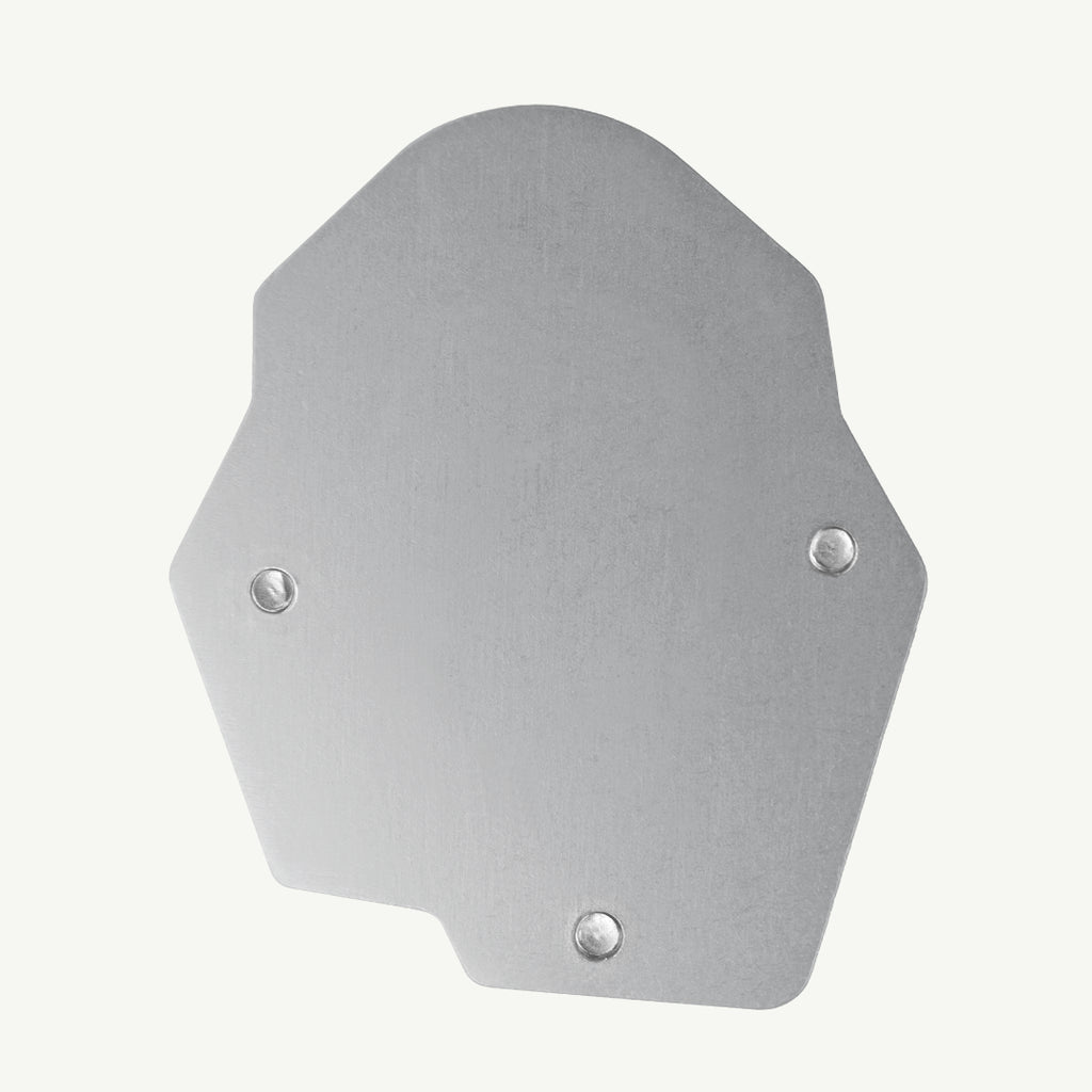 A brushed silver metal shield plate with a non-slip textured finish, featuring three pre-drilled screw holes, shown on a light off-white background.