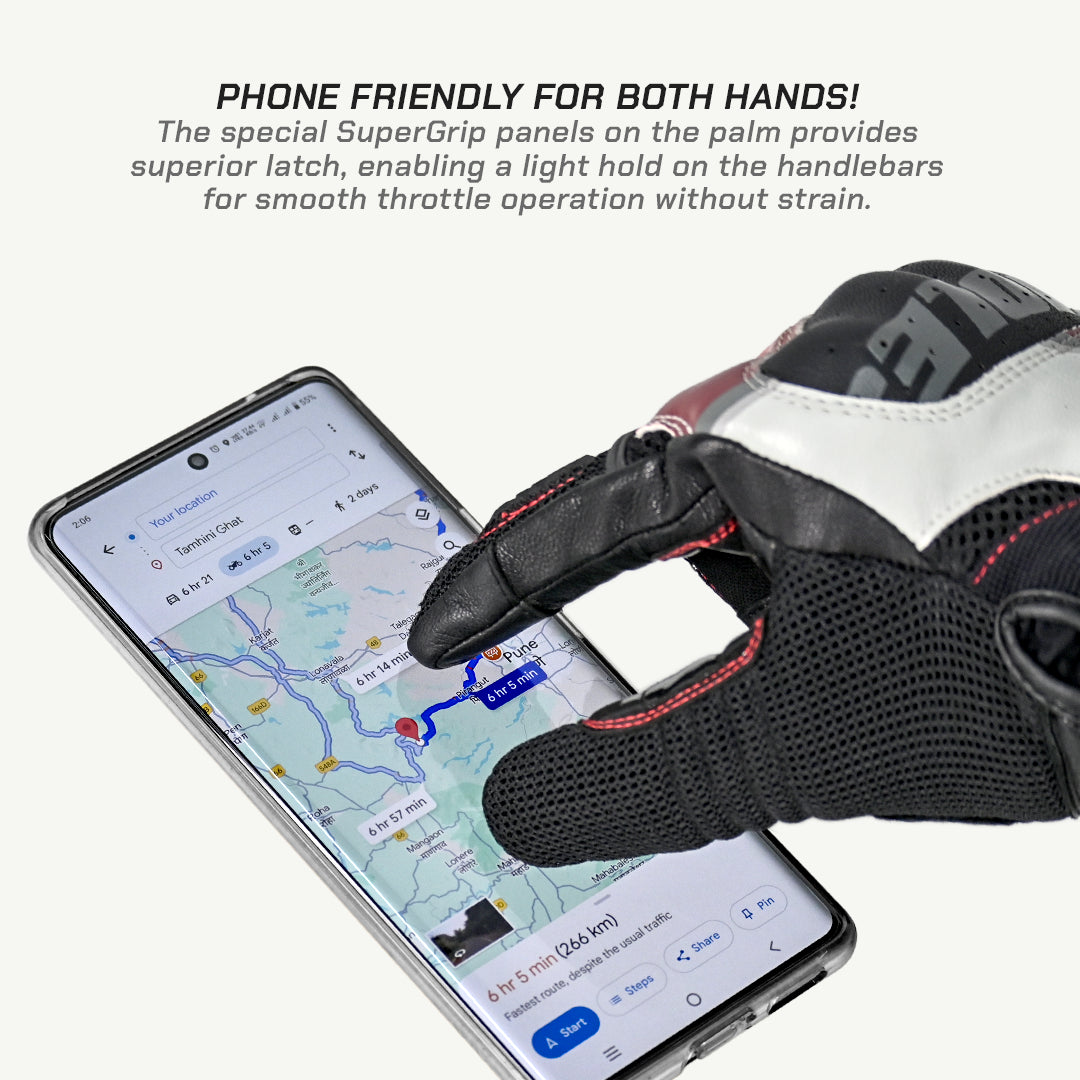 color_common Motorcycle glove with phone-friendly design on a smartphone displaying navigation app.