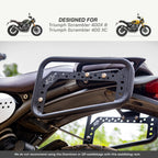 Black metal motorcycle saddlebag rack mounted on a motorcycle seat, with text at the top stating 'DESIGNED FOR Triumph Scrambler 400X & Triumph Scrambler 400 XC' and small motorcycle photos on either side.