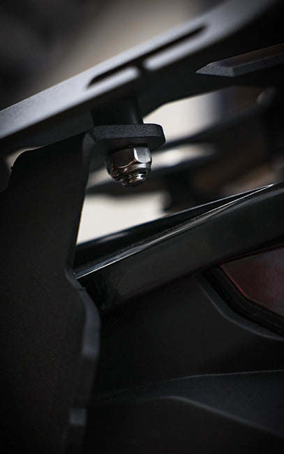Best in class materials and components Close-up of a metal bracket with a bolt on a blurred background