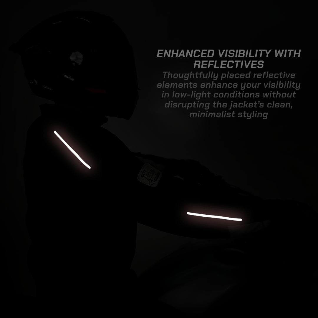 color_common Person wearing a black jacket with reflective elements in a dark setting, highlighting safety features.