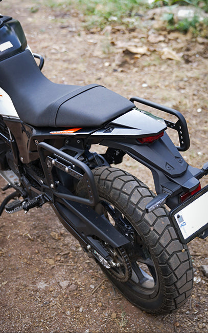 Designed for KTM Adventure 390 Gen 2 Motorcycle seat and rear wheel on a dirt path