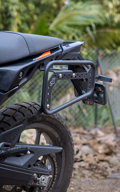 Ergonomics Close-up of a motorcycle with a rear rack against a natural background