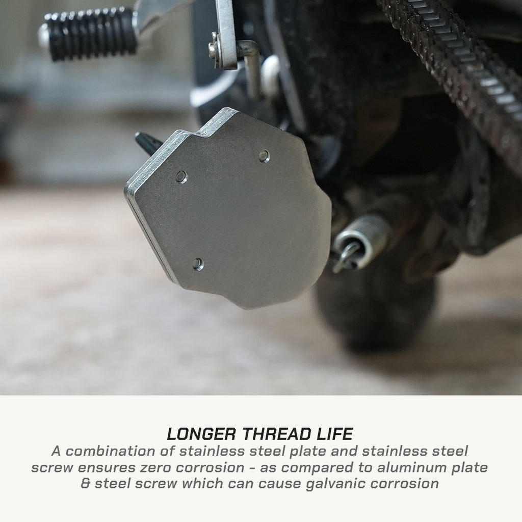 Close-up of a brushed metal motorcycle clutch release bearing assembly with a text overlay at the bottom explaining corrosion benefits.