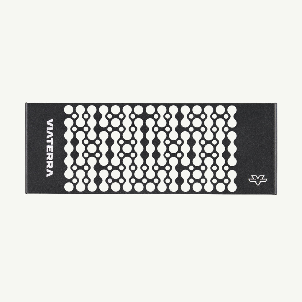 color_black A black rectangular hair tool or accessory with a white geometric dot pattern, shown on a plain off-white background. The brand name 'VIVERA' is printed vertically on the left side, and a small logo is printed on the bottom right.