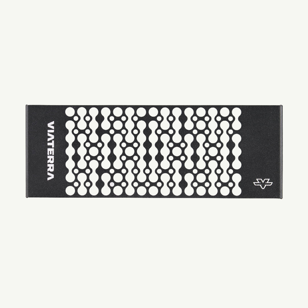 color_black A black rectangular hair tool or accessory with a white geometric dot pattern, shown on a plain off-white background. The brand name 'VIVERA' is printed vertically on the left side, and a small logo is printed on the bottom right.