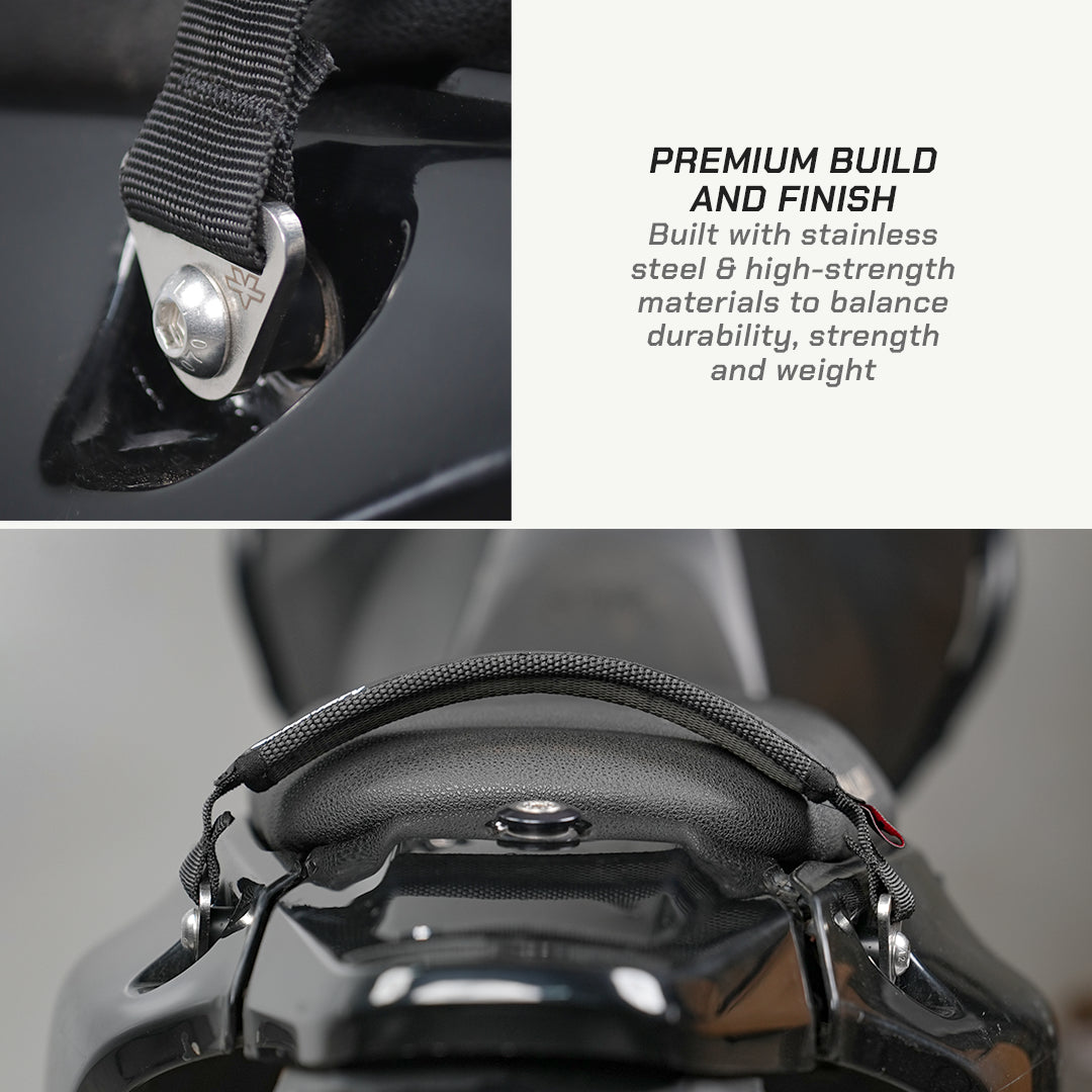 color_black Close-up detail shot of a motorcycle or bicycle seat belt buckle assembly with text on the right reading 'PREMIUM BUILD AND FINISH' and 'Built with stainless steel & high-strength materials to balance durability, strength and weight.'.