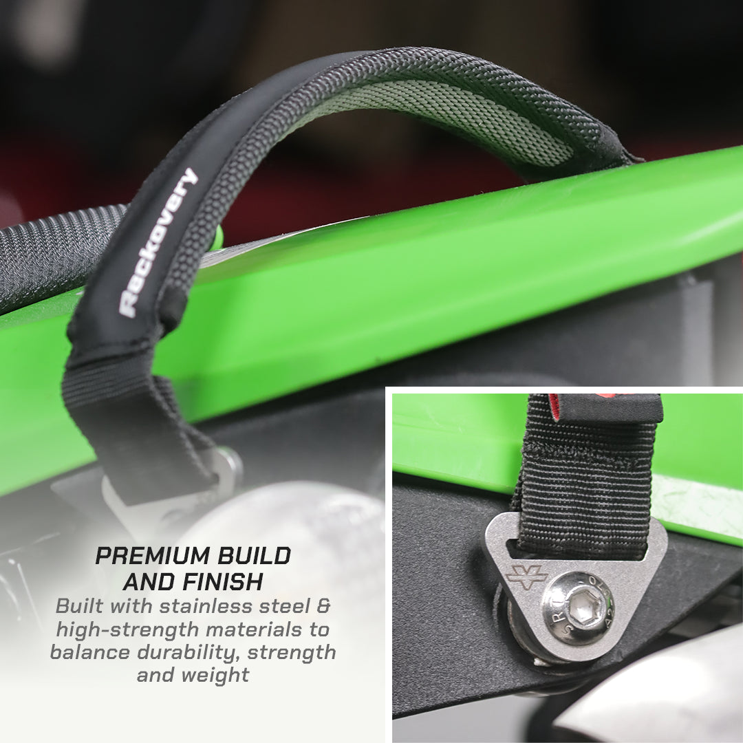 color_black A close-up of a black Recovery branded strap or handle wrapped around a bright green object, with a small inset showing a metal buckle detail. Text on the image reads 'PREMIUM BUILD AND FINISH' and describes stainless steel and high-strength materials.