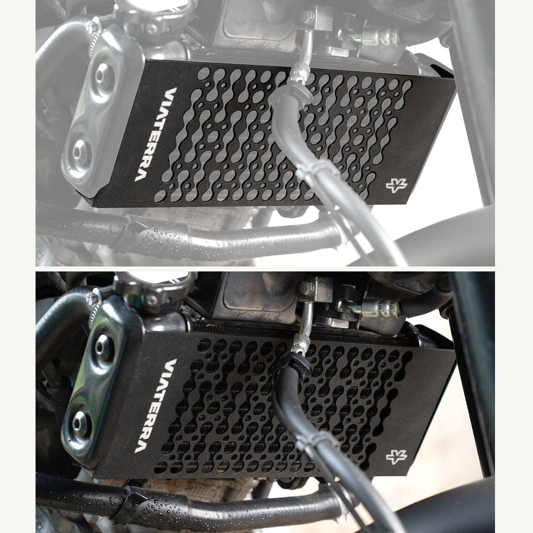 color_black A black metal engine guard with a honeycomb pattern and the brand name 'VIATERA' printed in white, shown installed on a motorcycle engine in a split-screen close-up.