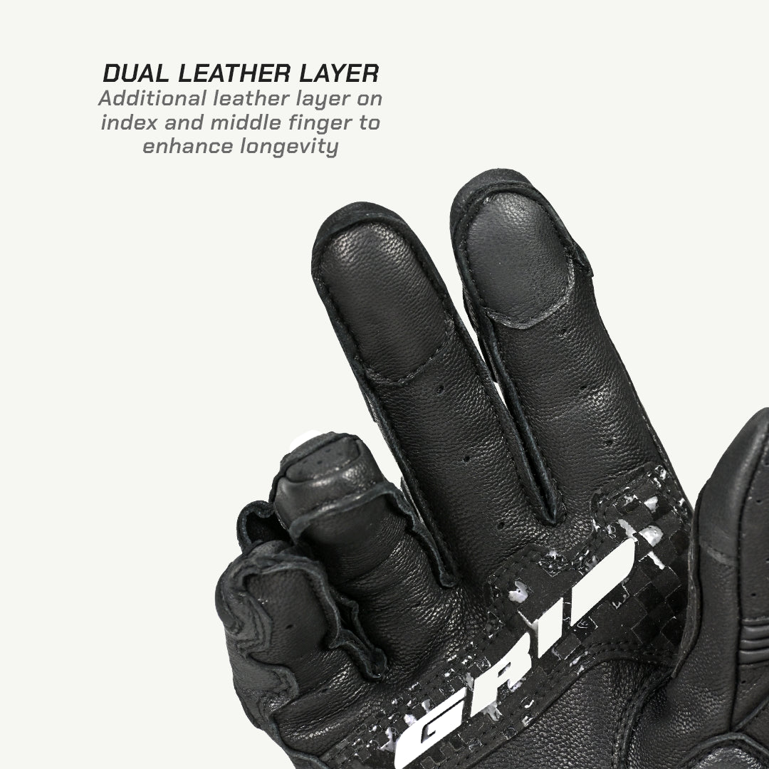 color_common Black glove with dual leather layer on index and middle finger, featuring the brand 'GRIP'.