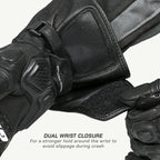 color_common Close-up of a black motorcycle glove with dual wrist closure feature on a white background
