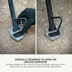 color_common Hand using a metal stand with a unique design on an uneven surface, featuring text about its functionality.