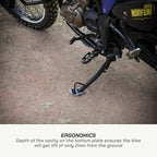 color_common Close-up of a motorcycle with a Norifumi logo on a dirt surface, focusing on ergonomic design.