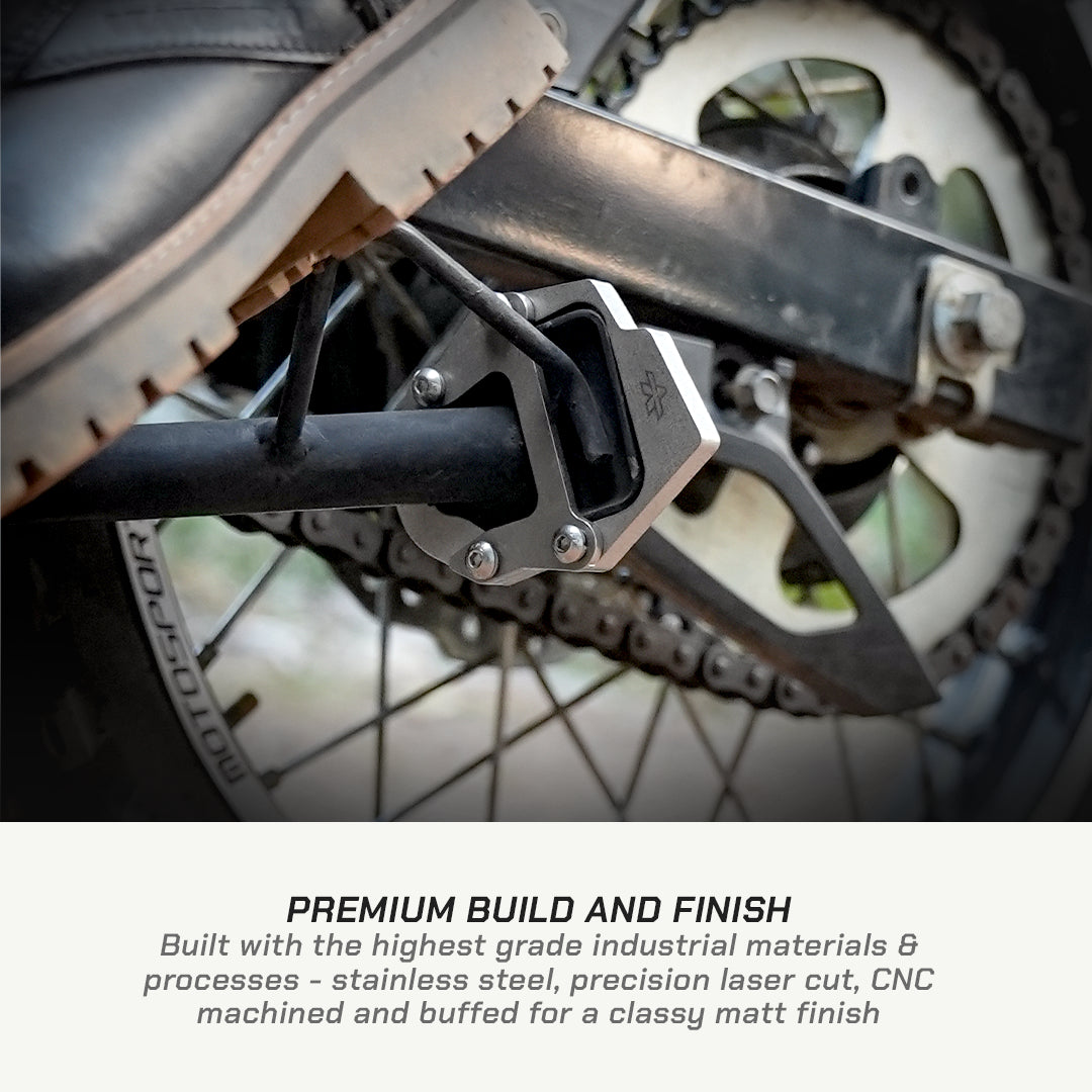 color_common Close-up of a motorcycle foot peg with text about premium build quality.