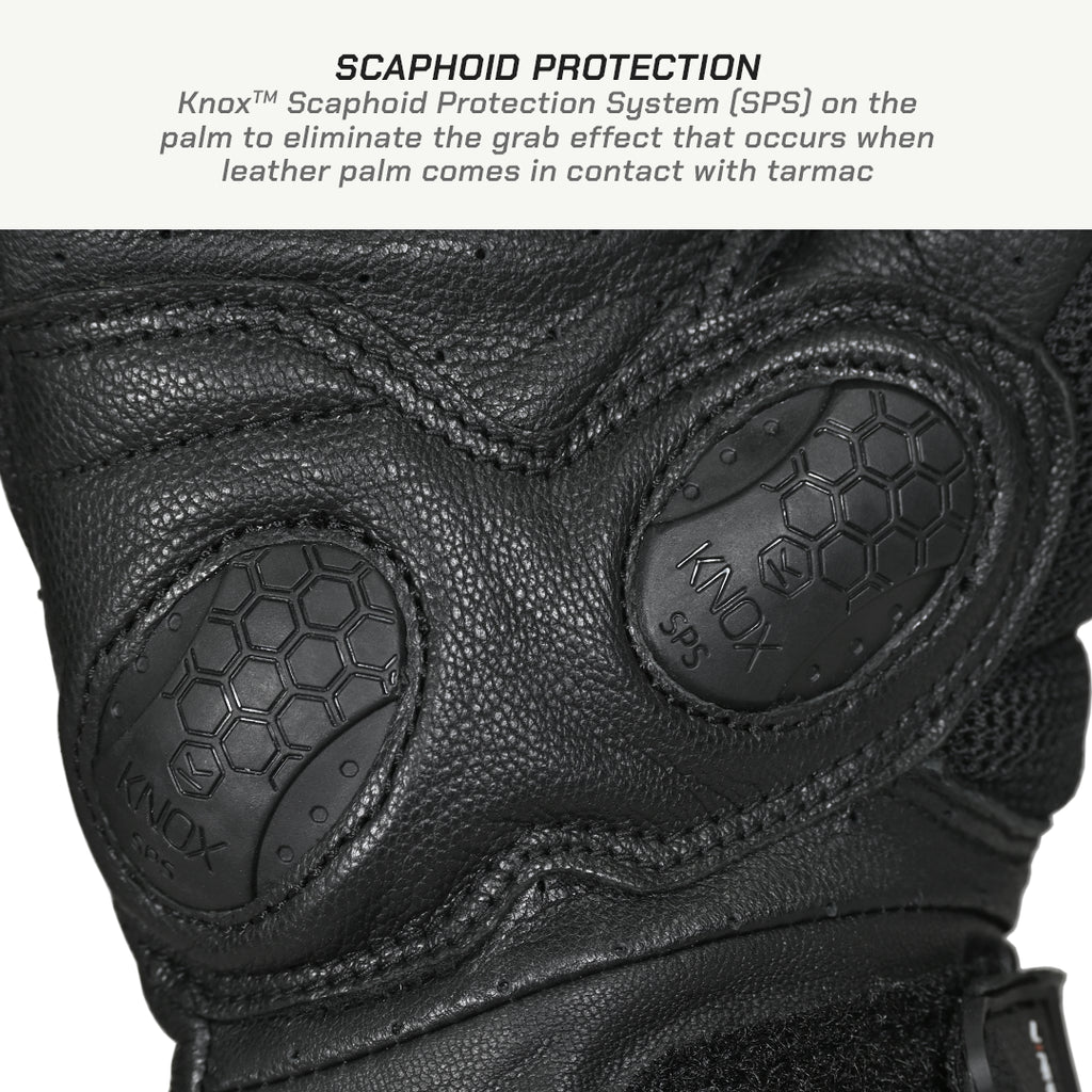 color_common Black glove with Knox Scaphoid Protection System on a white background