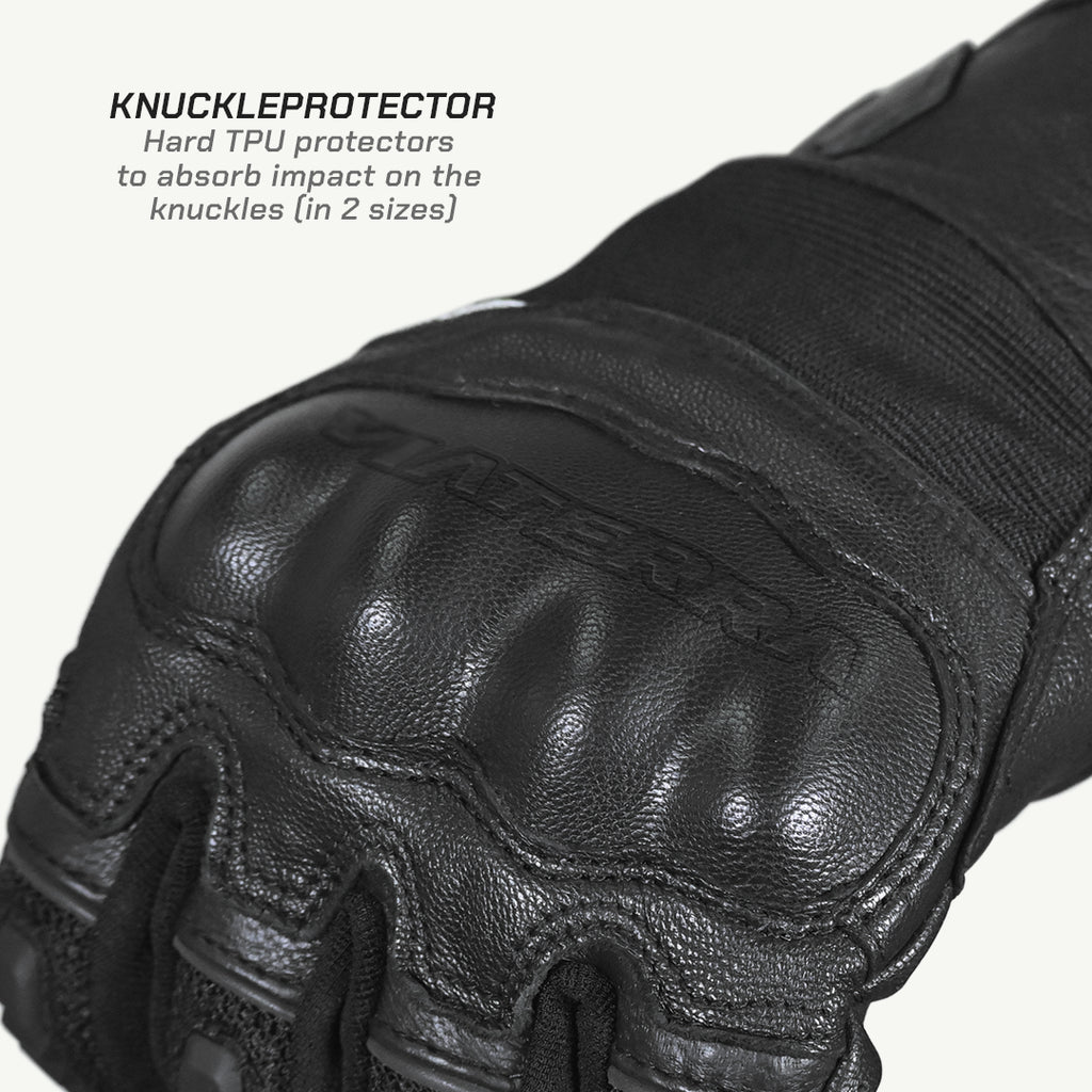 color_common Close-up of a black leather glove with knuckle protector on a white background