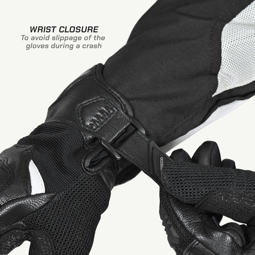 color_common Black motorcycle gloves with wrist closure feature on a white background