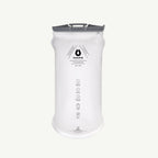 A white HydroPak Hydration 3-liter water bag with a gray quick-release strap and handle, shown on a light off-white background.