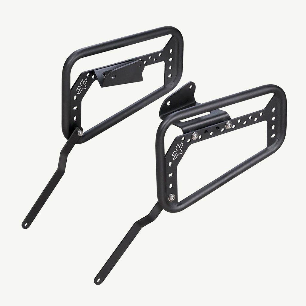 Saddlebag Rack - KTM Enduro 390 Two black metal bike racks on a white background