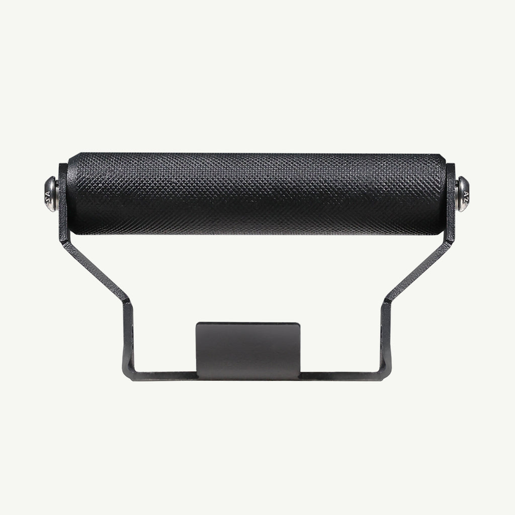KTM Adventure 390 GEN 2 Mobile Mount Black metal roller with textured surface on a white background