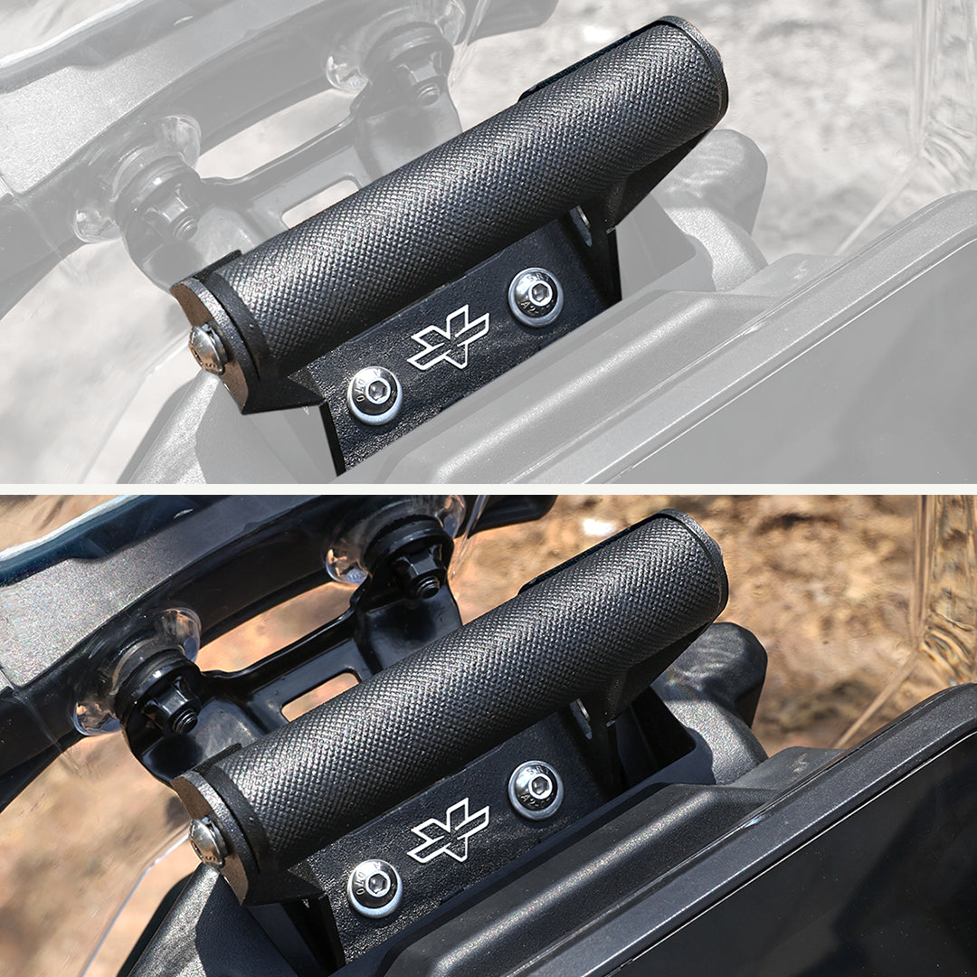 KTM Adventure 390 GEN 2 Mobile Mount Close-up of a black textured handlebar grip on a vehicle, with a brand logo visible.