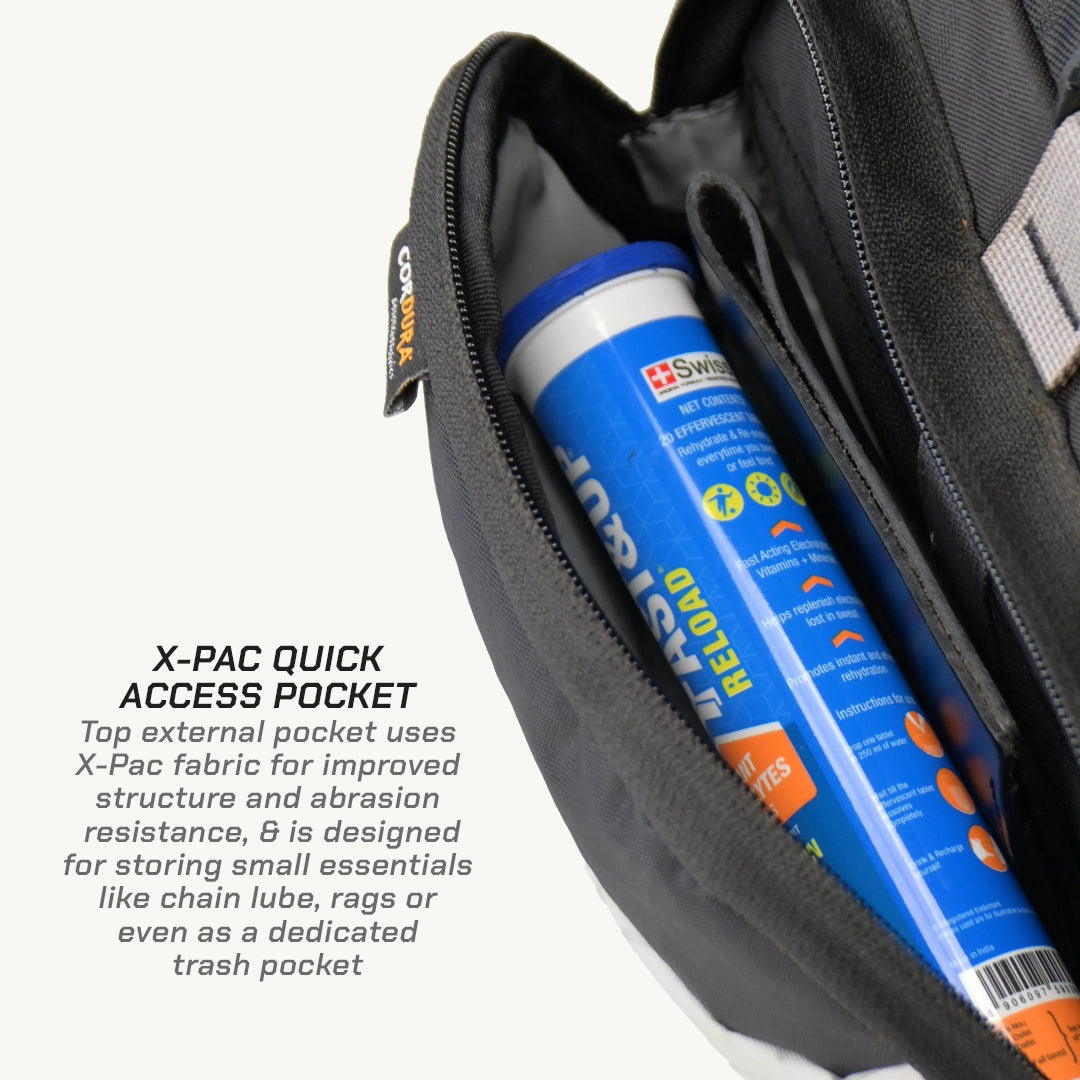 LFA Enduro Saddle BagX-Pac quick access pocket with a can of lubricant inside, featuring text about the pocket's design.