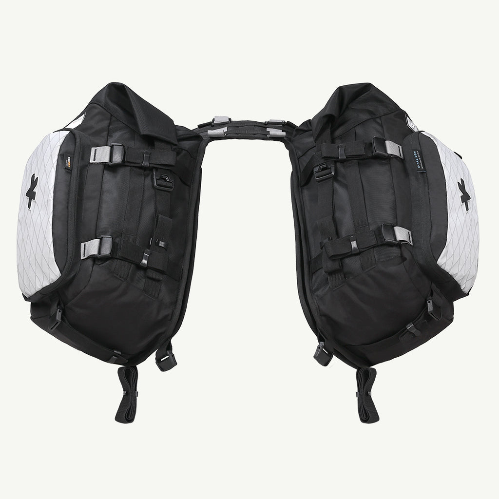 LFA-SaddleBag Black and white backpack on a white background