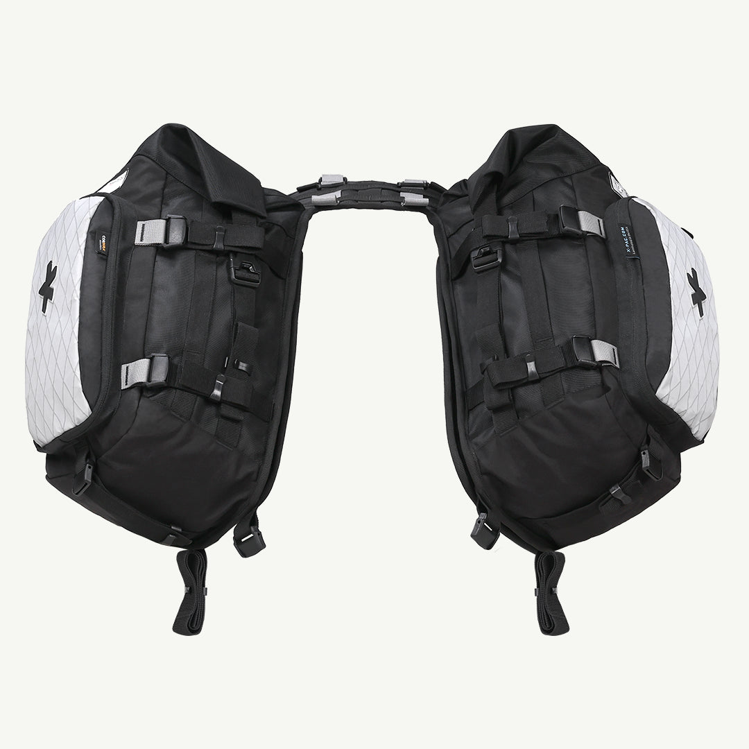 LFA-SaddleBag Black and white backpack on a white background