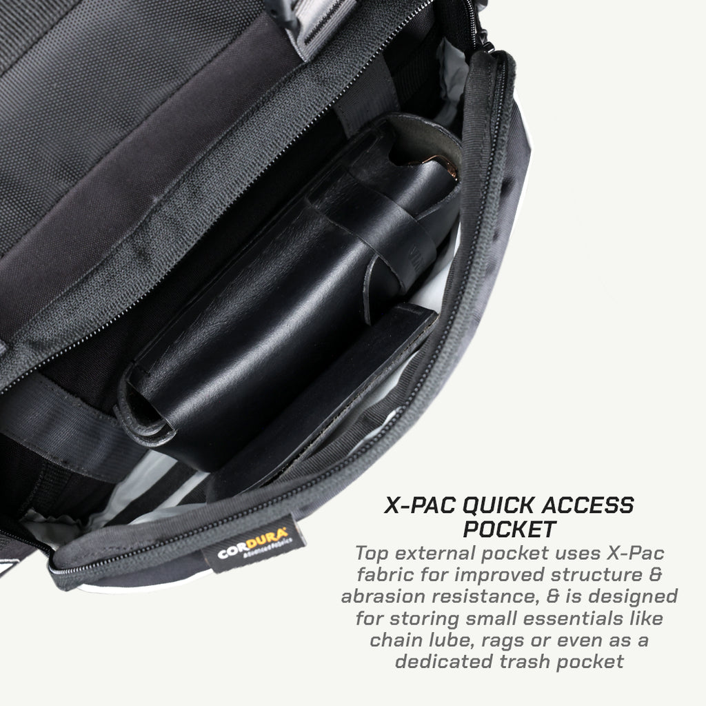 LFA-SaddleBag Black backpack with X-Pac quick access pocket and Cordura fabric label.
