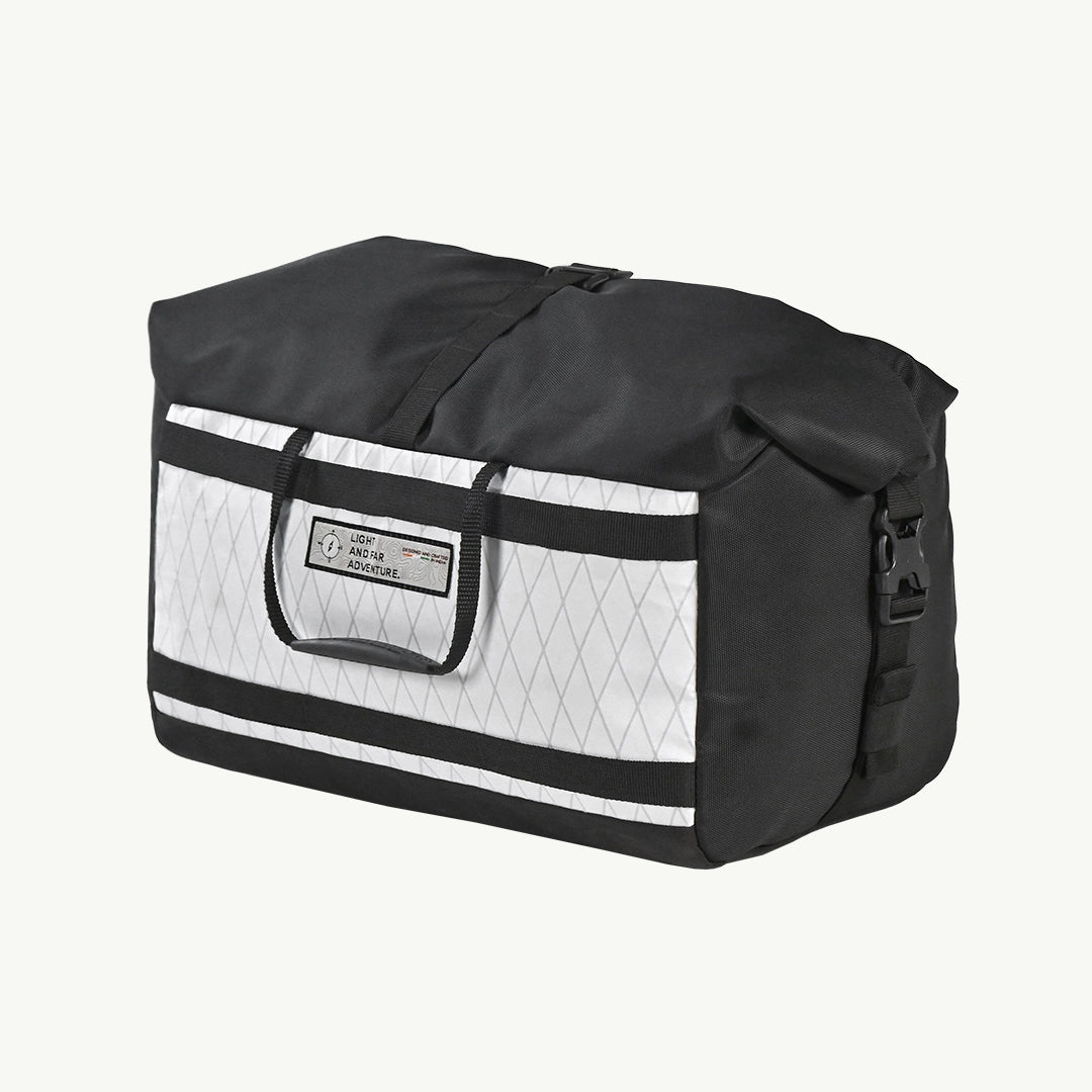 ViaTerra LFA - Tailbag Black and white duffel bag with reflective stripes on a white background