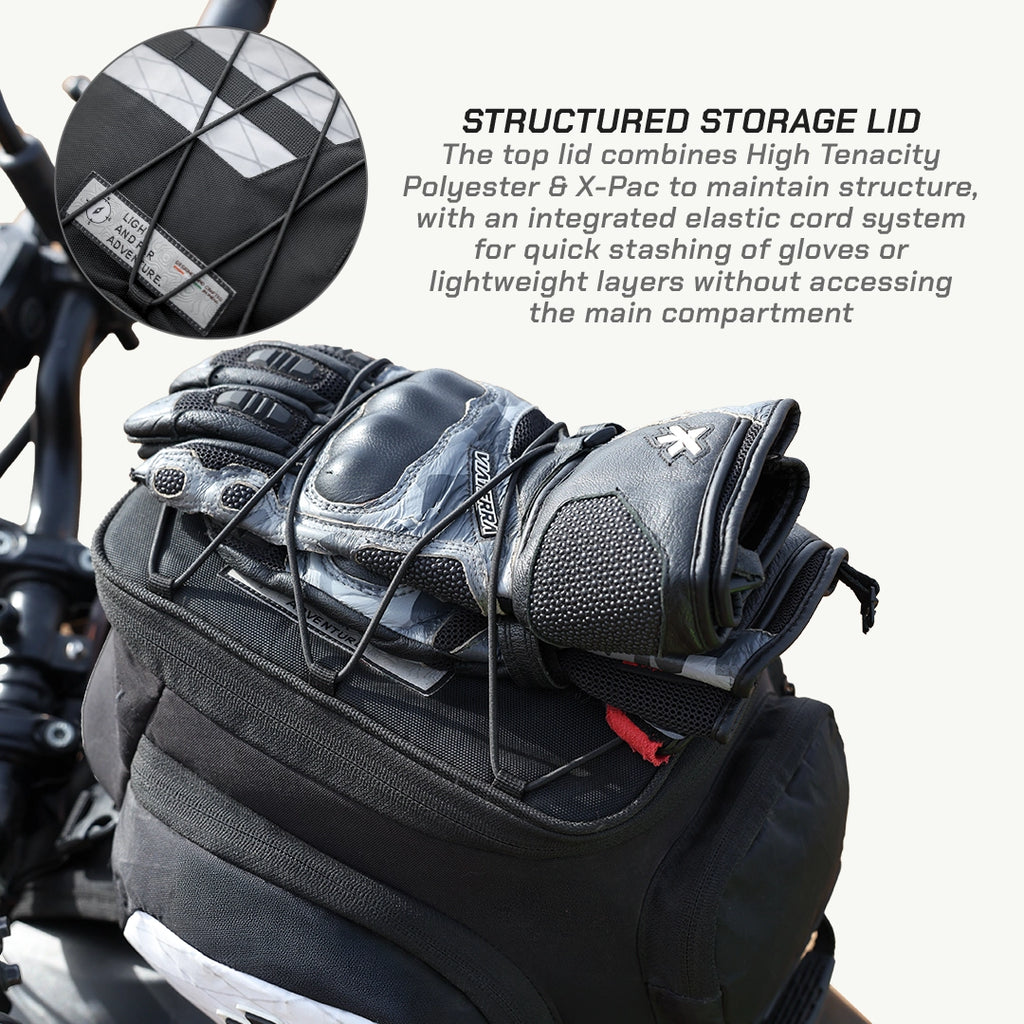 LFA - Tank Bag - XC Motorcycle saddlebag with gloves and a structured storage lid on a motorcycle.