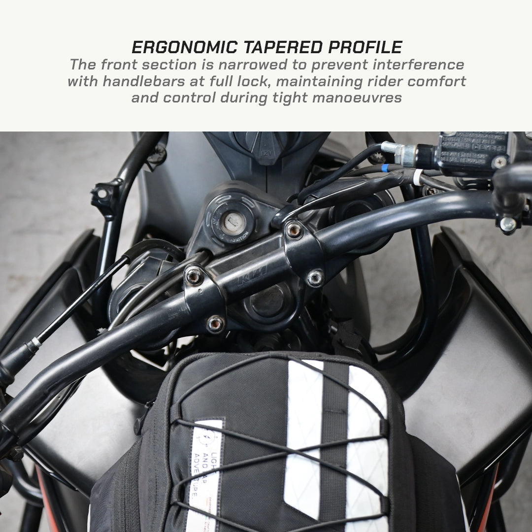 LFA - Tank Bag - XC Close-up of a motorcycle handlebar with ergonomic tapering profile text