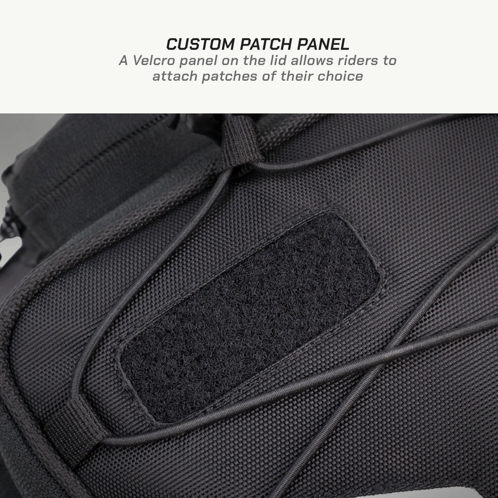 LFA - Tank Bag - XC Black backpack with a Velcro patch panel on a gray background