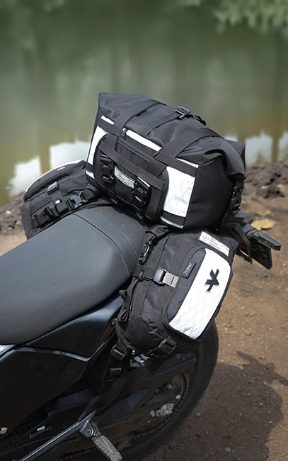 Load Expansion Holster Motorcycle with black travel bags attached to the back
