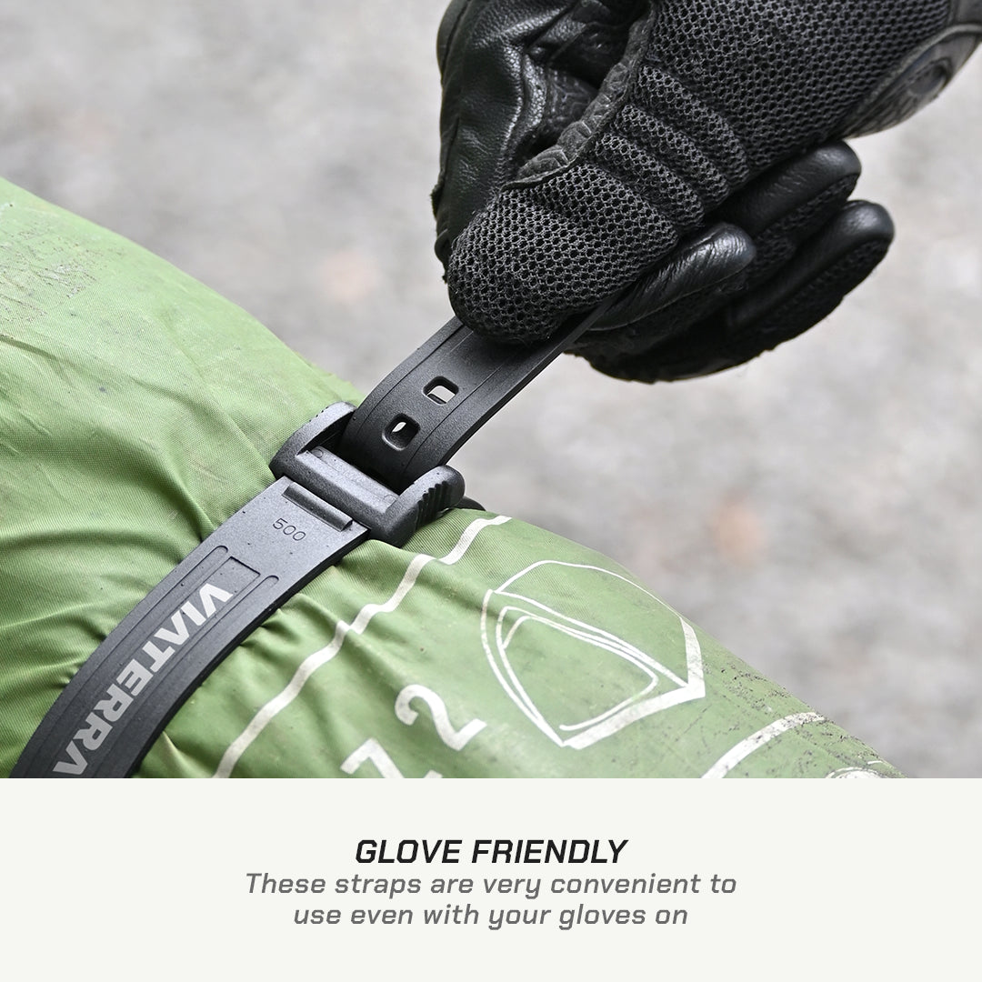 Color_Common Person wearing a black glove interacting with a strap, with text 'Glove Friendly' on a blurred background.