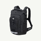 A black tactical backpack with multiple zippered compartments, compression straps, and a white logo on the front pocket, shown against a light off-white background.