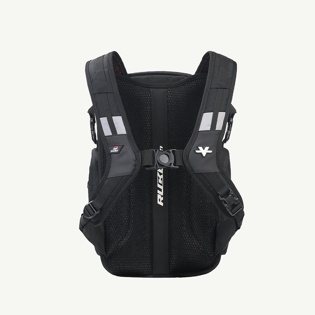 A black Ruxa cycling backpack shown from the back, featuring a breathable mesh back panel, padded shoulder straps, reflective white stripes, and a central vertical strap with the RUXA logo.