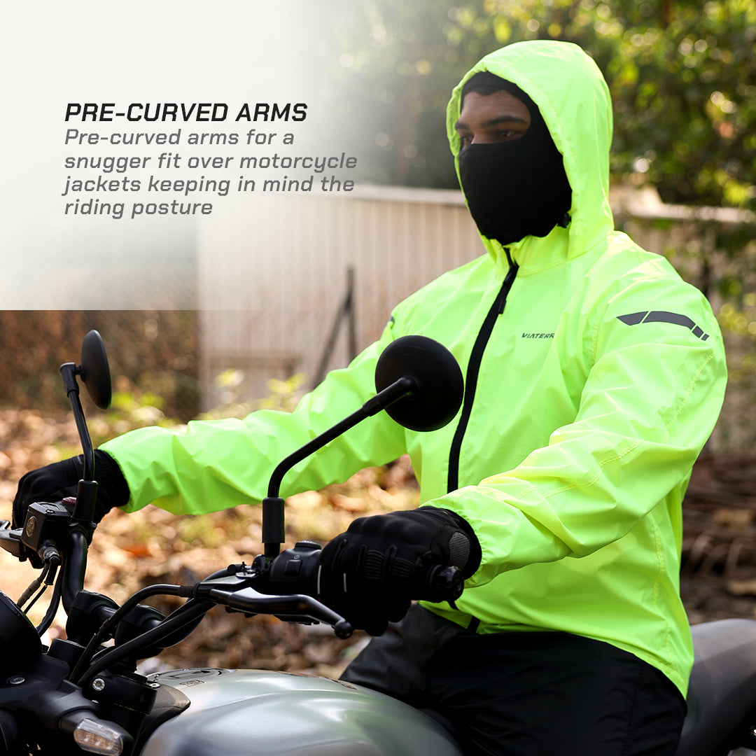 color_Fluoroscent-Green Person wearing a bright yellow-green motorcycle jacket with pre-curved arms on a motorcycle.