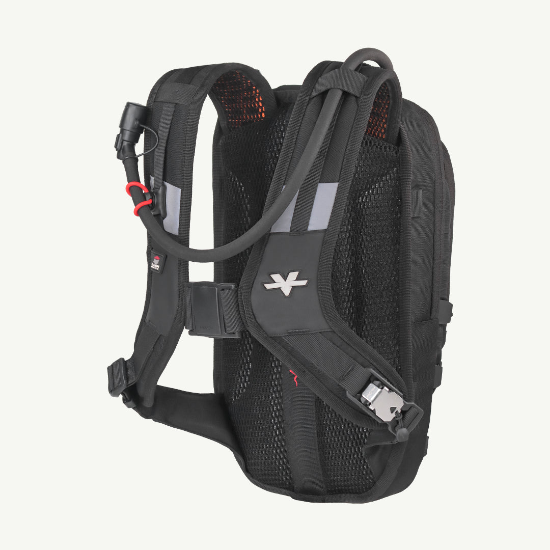 Black hydration backpack with reflective gray shoulder straps and a white logo, shown from the back on a light off-white background.