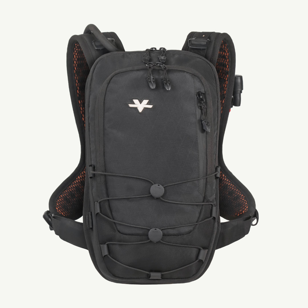 A black hydration backpack with orange mesh lining and a white stylized logo on the front, shown against a light off-white background.