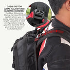 Close-up of a black backpack worn by a person, with an inset circle showing the adjustable sliding harness strap and text explaining the DASH system.