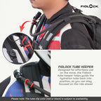 Fidlock hydration tube keeper shown on a rider's chest with a backpack, including a close-up inset of the clip attachment and product text explaining the tube keeper feature.