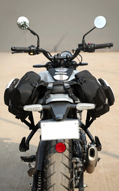 Structured Rackless Design Motorcycle with black saddlebags on a blurred background