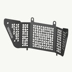 color_black A black metal radiator guard with via terra branding, designed for protection against debris for a KTM motorcycle.